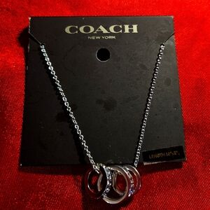 Necklace by COACH. Sterling Silver.